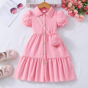Vestido de niña con bolso de perla
