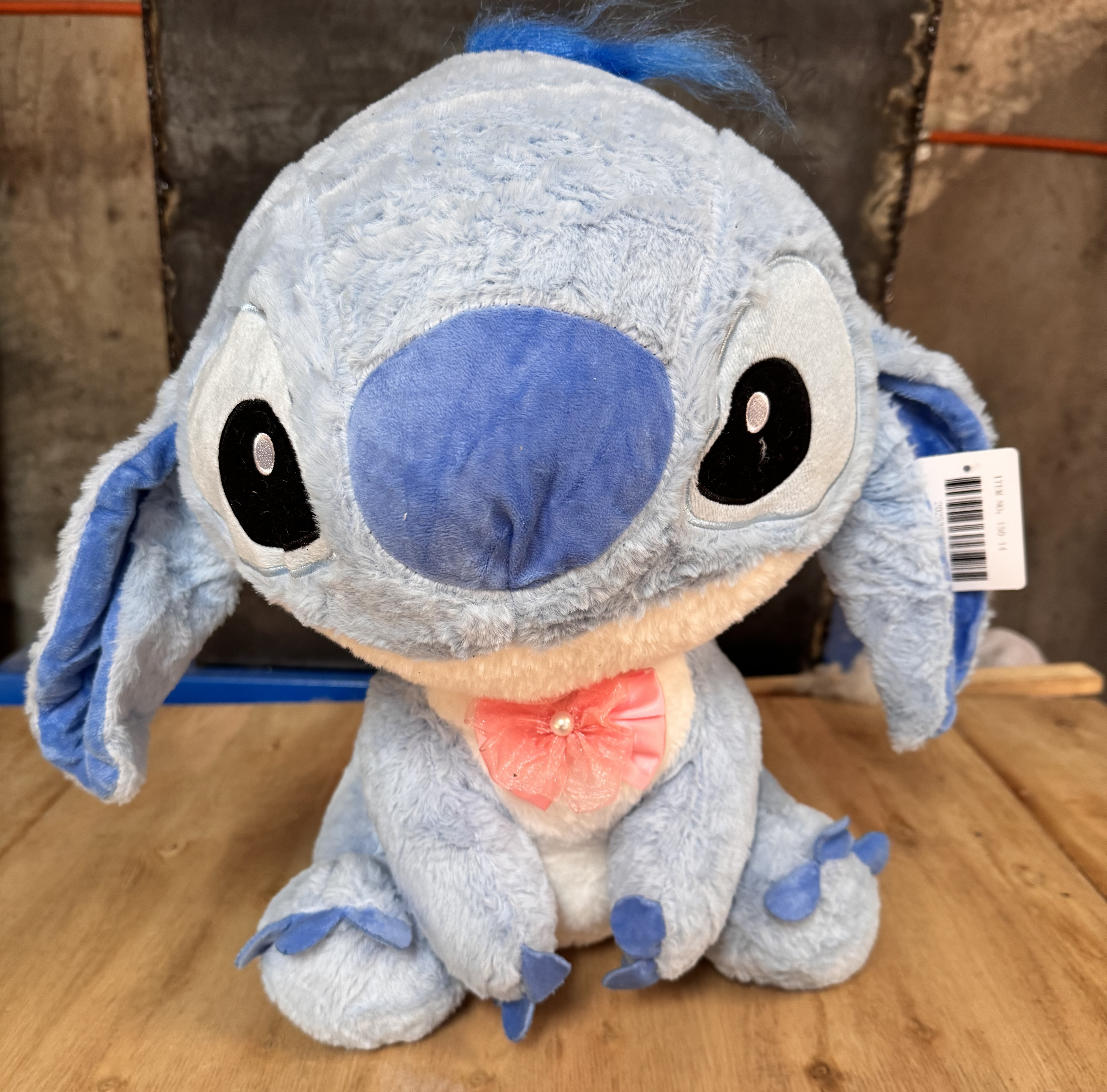 Peluche Stitch con moño 🎀💙 - 40 cms