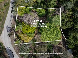NEW LISTING! Prime Road Front Lot Between West Bay & West End